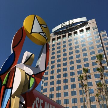 Bruno Scanga's colorful sculpture Figure holding the Sun, stands in the heart of downtown San Jose