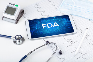Close-up view of a tablet pc with medical abbreviation