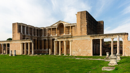 Fototapeta na wymiar Sardis ancient city which has gymnasium and synagogue ruins and columns in Manisa, Turkey