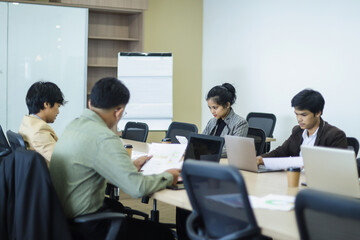 Business people working on laptop in meeting conference room at the office 