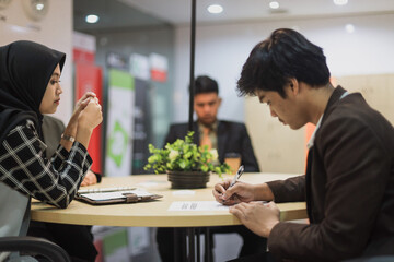 Job interview. Employee signing business contract document. Successful candidate selection for employment.