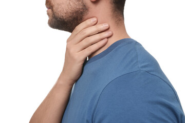 Man suffering from sore throat on white background, closeup