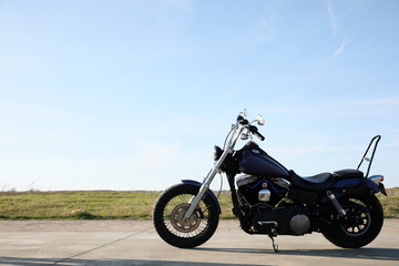 Fototapeta na wymiar Modern black motorcycle on sunny day outdoors