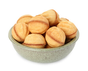 Bowl of delicious nut shaped cookies with condensed milk on white background