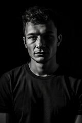 Fototapeta premium А black and white photo of a young man, ai-generated artwork