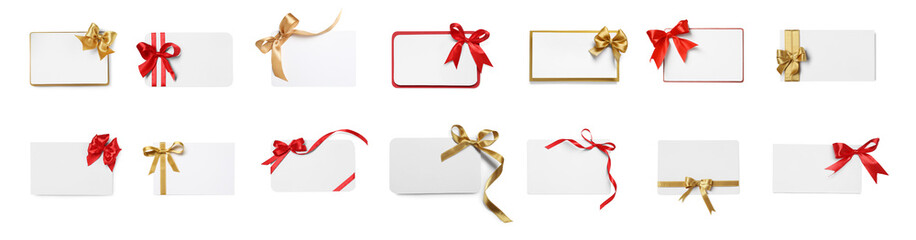 Set of many different gift cards with bows on white background, top view
