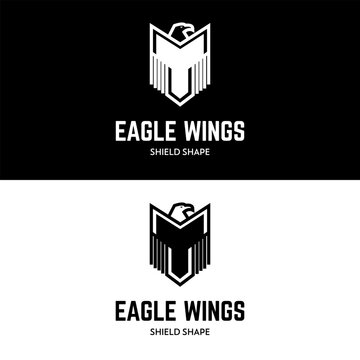 Eagle in shield shape wing logo design icon