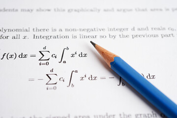 Pencil on mathematic formula exercise test paper in education school.