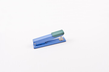 Blue stapler isolated on white background, clipping path included.