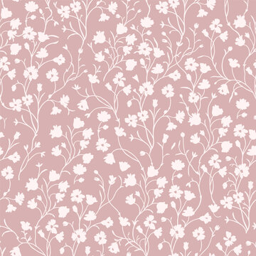 Spring floral pattern of white flowers and twigs on a pale pink background.