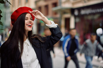 Woman smile with teeth tourist walks in the city, stylish fashionable clothes and makeup, spring walk, travel.