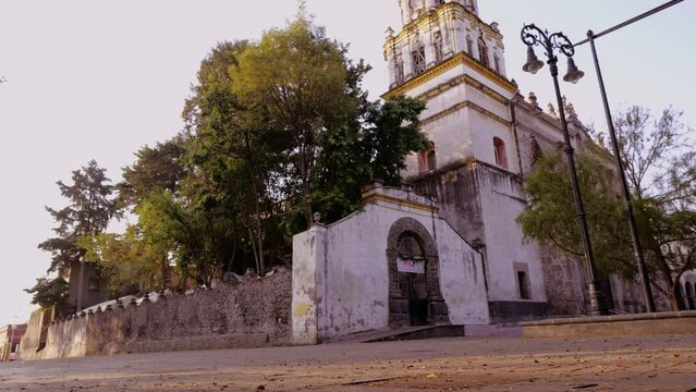 View of San Juan Bautista Parish in  Coyoacan, one of oldest churches in Mexico City, 4K Video.