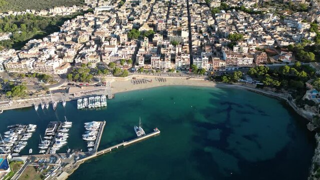 Porto Cristo Beachfront Town With Marina Near Sa Coma In Mallorca Eastern Coast, Spain. Aerial Drone Shot