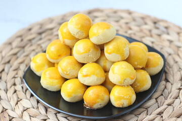 nastar cookies, pineapple tarts or nanas tart are small, bite-size pastries