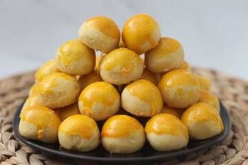 nastar cookies, pineapple tarts or nanas tart are small, bite-size pastries