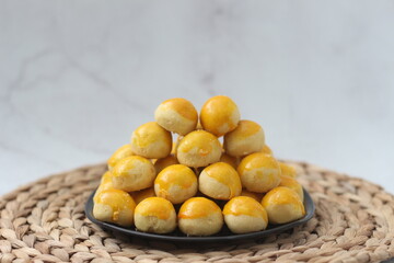 nastar cookies, pineapple tarts or nanas tart are small, bite-size pastries
