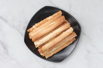 egg roll or Semprong is snacks that normally serve on Hari Raya or Eid Al Fitr