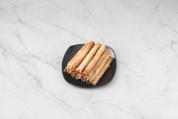 egg roll or Semprong is snacks that normally serve on Hari Raya or Eid Al Fitr.