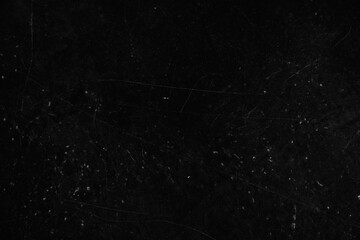 The black texture of the walls as a background overlay for your design, with a grunge texture with scratches and spaces to copy. High quality photo