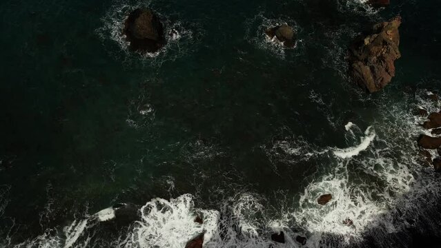 Topdown View Of Ocean Waves Hitting The Rocks In Ponta de Sao Lourenco, Madeira, Portugal.