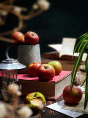 In the frame ripe red apples against black background 