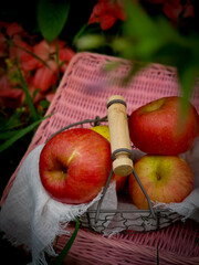 In the frame ripe red apples. Outdoor background 