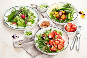 Various of spring vegetable salads. Tasty healthy food.
