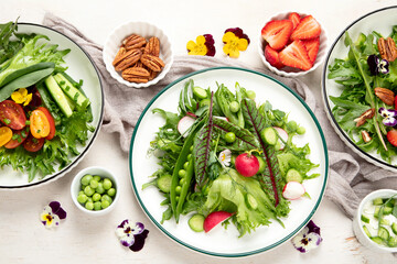 Various of spring vegetable salads. Tasty healthy food.