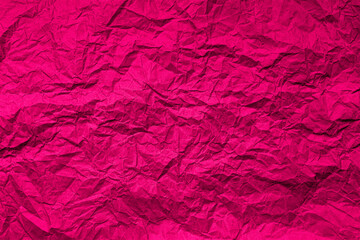 Fototapeta premium Natural abstract textured background of wrinkled pink paper.