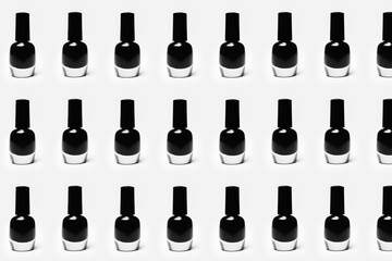 Obraz premium Pattern of glitter nail polish of black color isolated on white background.
