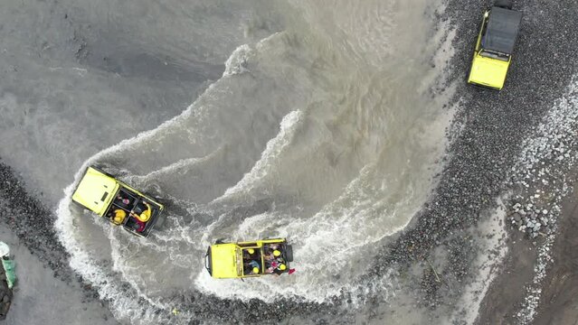 Lava Tour Trip in Kali Kuning and tourist enjoying the advanture with Jip in Kali Kuning River
