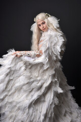 fantasy portrait of beautiful female model with long blond hair wearing otherworldly  white...