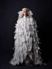 fantasy portrait of beautiful female model with long blond hair wearing otherworldly  white...