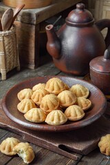 Kueh Bolu or Kuih Bahulu is a sponge cake. Asian traditional food is popular in Malaysia and Indonesia.