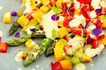 Asparagus salad with fruit.