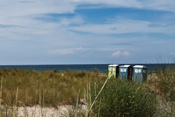 Three PORTABLE TOILET on the Beach, Warnemünde Germany