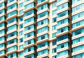 Modern buliding hotel with pattern blue window glass