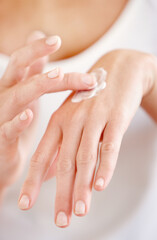Hand cream, moisturizer and woman hands closeup with beauty and skin glow from treatment. Wellness, sunscreen and skincare lotion of a female person with manicure and cosmetics application with care