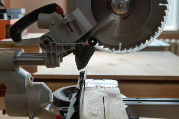 Close-up of a circular saw in a workshop.
