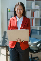 Business, finance and employment, female successful entrepreneurs concept. Confident smiling asian businesswoman, using laptop at work.