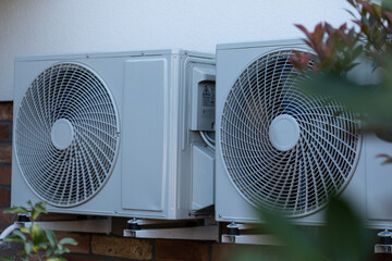 air conditioner outdoor unit on a black background