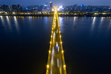 Fototapeta na wymiar Night view of Zhuzhou Bridge, Hunan Province, China
