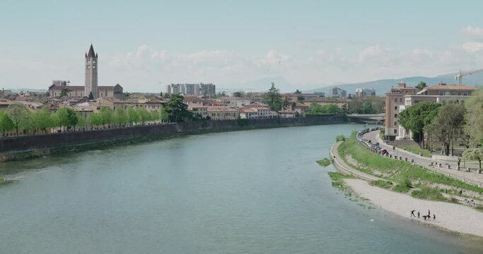 Panorama Of Adige River With San Zeno Maggiore Bell Tower In Verona, Italy. - wide