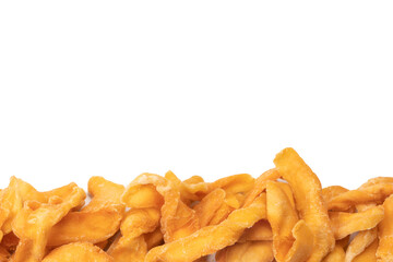 Dried melon slices isolated on a white background.