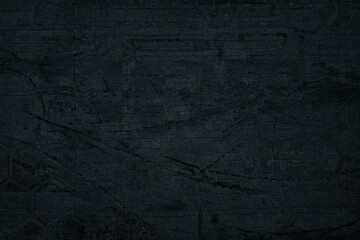 Black dirty stone wall texture. Dark rough masonry wallpaper. Night gloomy grunge abstract background