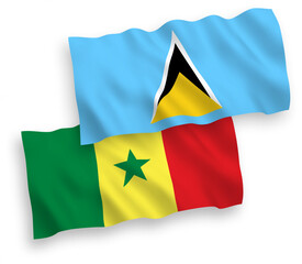 Flags of Saint Lucia and Republic of Senegal on a white background