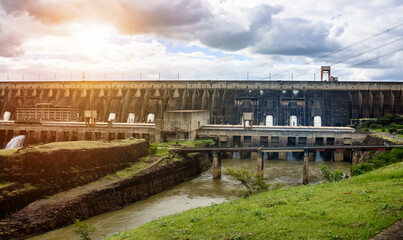 Fototapeta na wymiar View of modern giant dam, located on Parana river. Itaipu Binacional hydroelectric power station in Foz do Iguazu Brazil on border with Paraguay. Hydro electrification concept. Copy ad text space