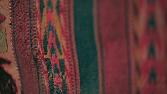 Panorama of handmade carpets with Asian patterns