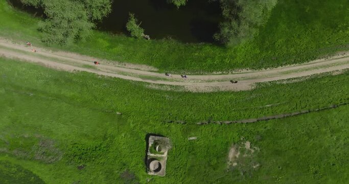 group of people running on country road on dniestr nistru river shore
