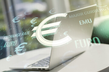 Double exposure of creative EURO USD symbols hologram on laptop background. Banking and investing concept